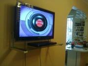 Установка монтаж навеска телевизора на стену в Алматы