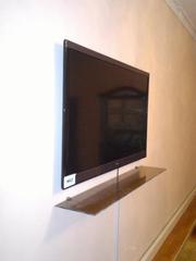 Установка  навеска телевизоров на стену в Алматы